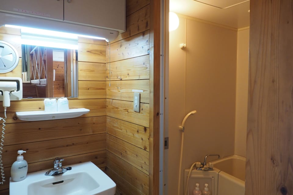 [Villa Type] Family Lodge, with Kitchen, Private Bath & Toilet, WiFi, Non Smoking | Bathroom | Hair dryer, bathrobes, slippers, electronic bidet