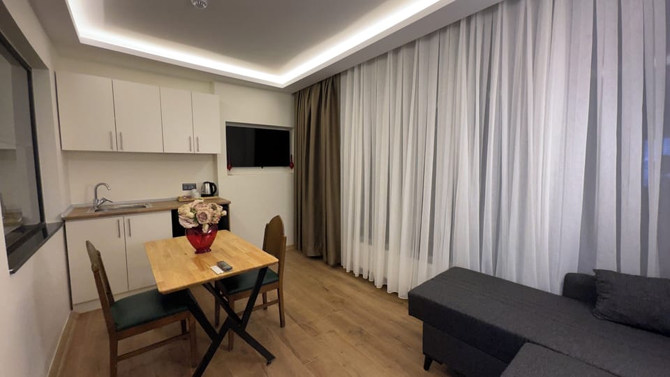 Family Suite | Living area | 40-inch Smart TV with digital channels