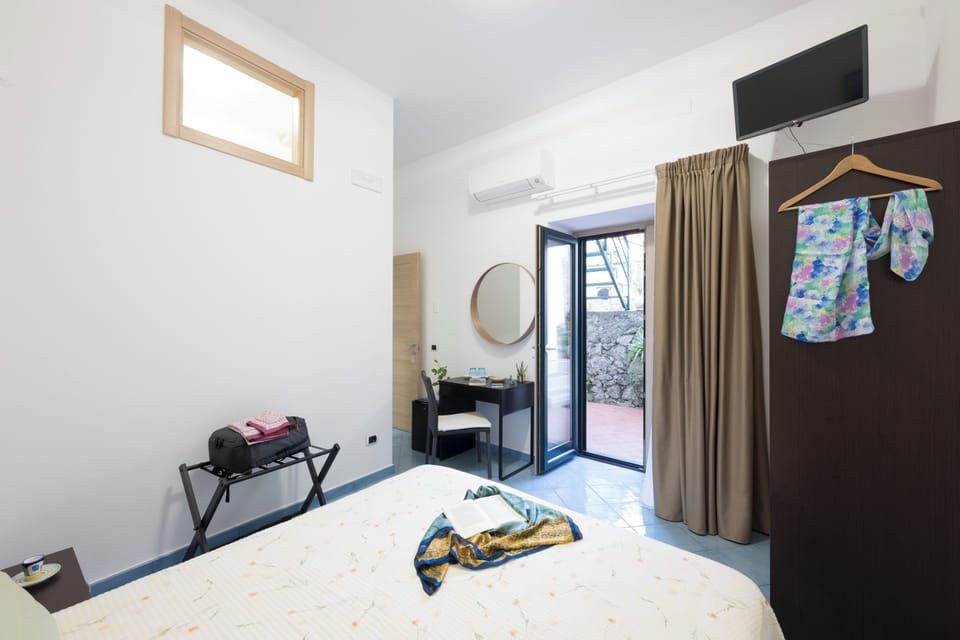 Classic Double or Twin Room, Patio, Garden View | In-room safe, desk, laptop workspace, soundproofing