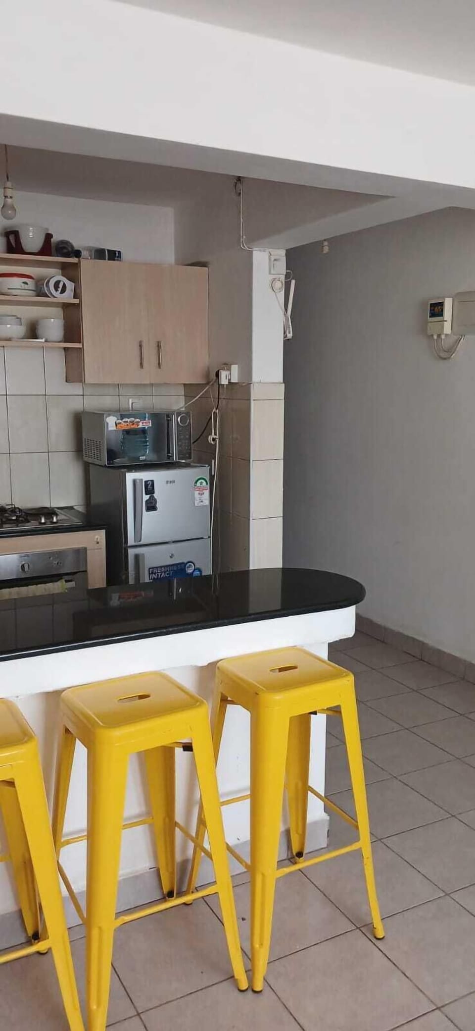 Family Apartment, City View | Private kitchen | Fridge, microwave, cookware/dishes/utensils, dining tables