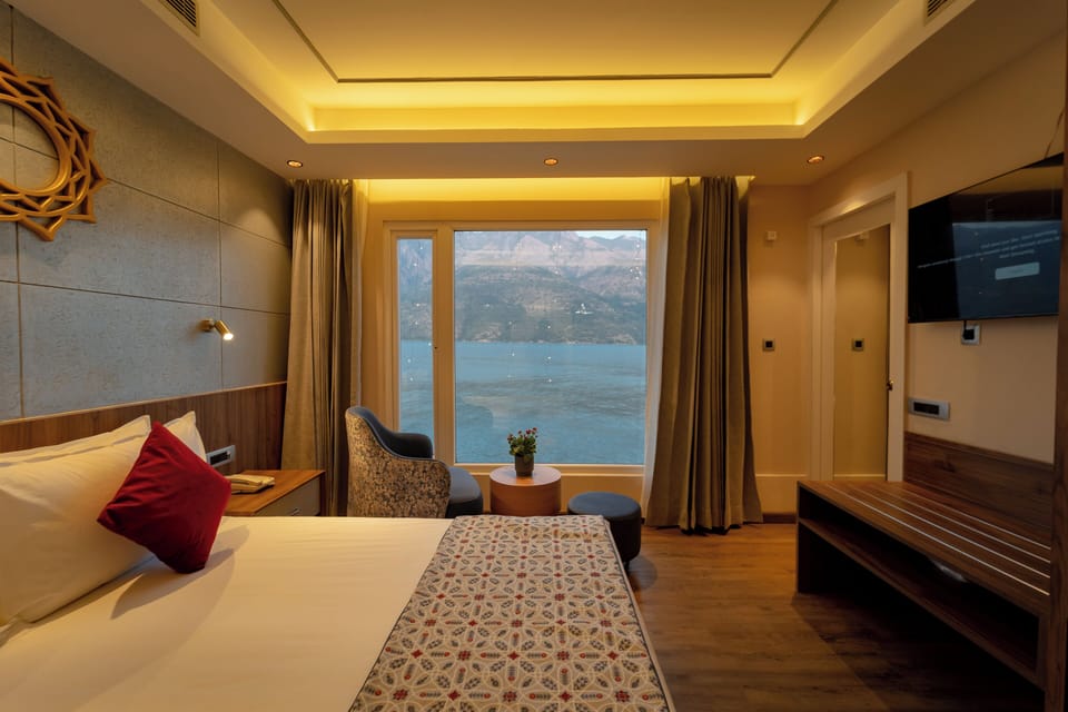 Deluxe Double Room, Lake View | In-room safe, desk, blackout drapes, iron/ironing board
