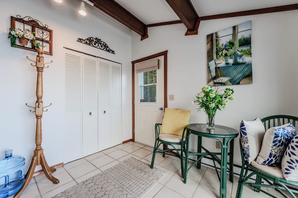 The inviting entryway sets the tone for your stay with cozy seating and thoughtful touches. A perfect spot to kick off your shoes after exploring Lion’s Head or Bruce Peninsula National Park.