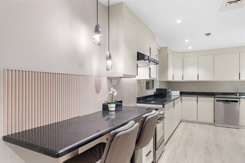 Gourmet Kitchen: Sleek design meets modern appliances for culinary adventures in style!