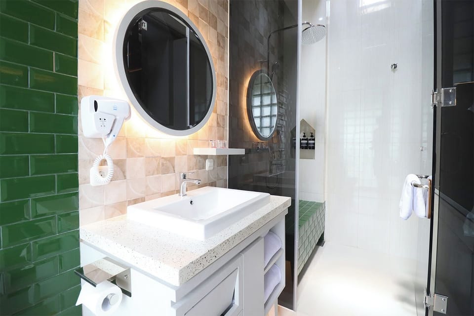 Shower, hair dryer, bathrobes, slippers