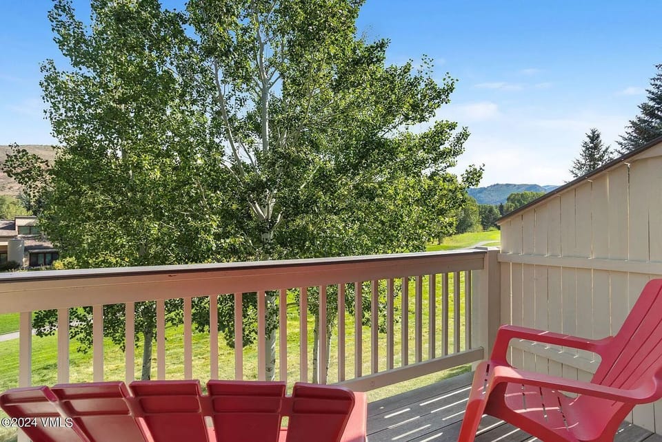 Balcony off primary suite in summer