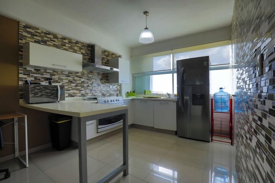 Deluxe Apartment, Patio | Private kitchen