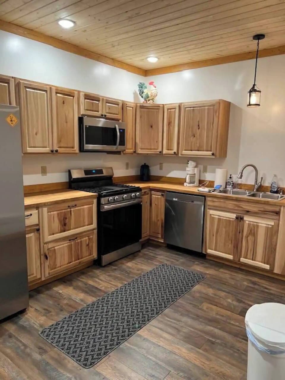Full kitchen. Refrigerator freezer, oven, stove, dishwasher and sink. 