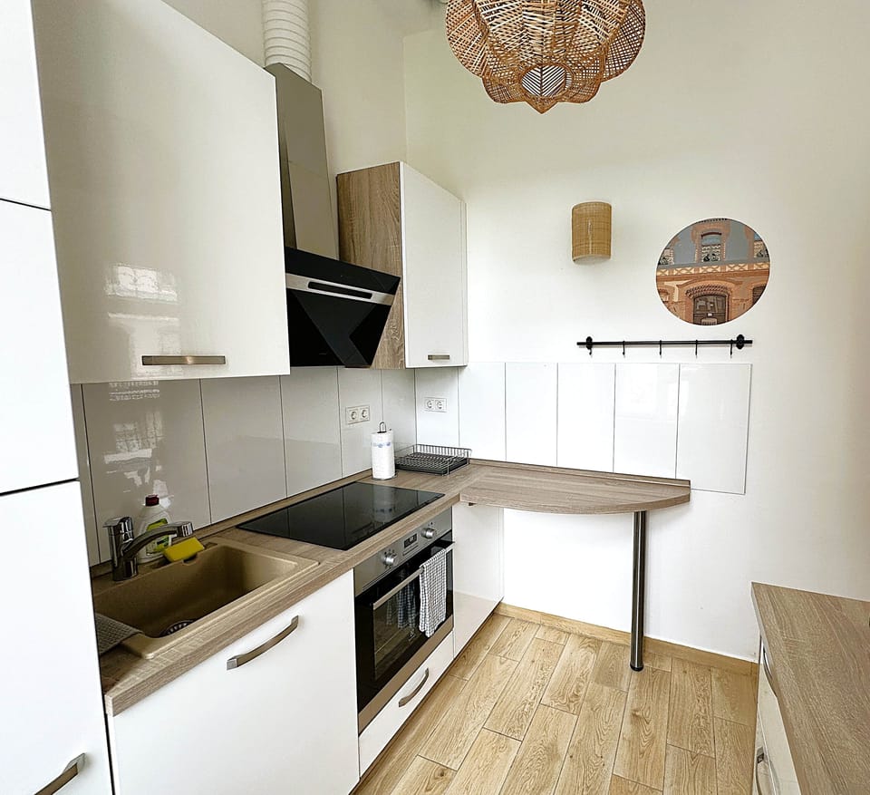 Fitted kitchen with courtyard view