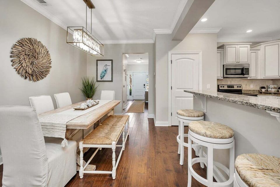 Dining area with bench seating and pendant lighting