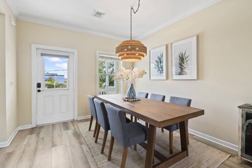 Just inside the front door the stylish dining room table offers a perfect spot for shared meals or evening games.