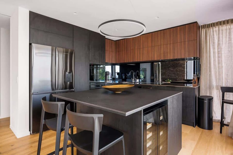 Gourmet Kitchen with Nespresso Machine
Enjoy the convenience of a Nespresso machine in the sleek, well-stocked kitchen, ideal for preparing both meals and your favorite coffee.