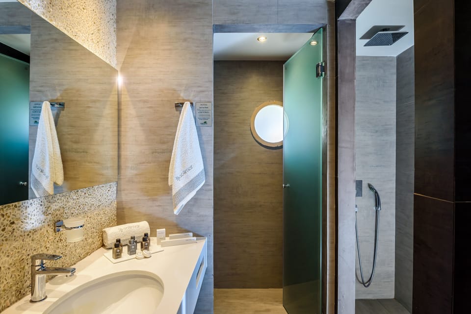 Deep soaking tub, rainfall showerhead, free toiletries, hair dryer