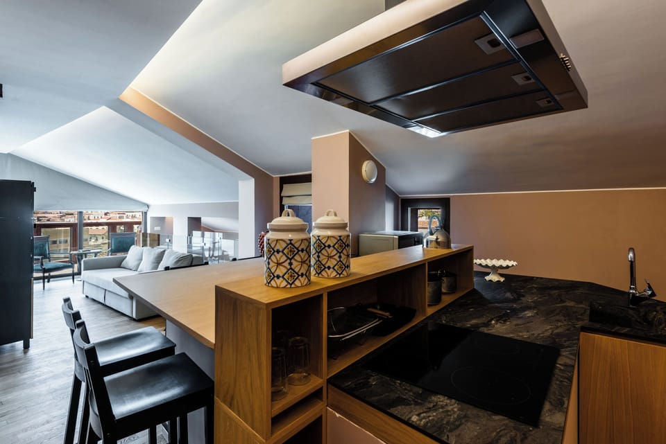 Deluxe Duplex | Private kitchen | Full-size fridge, microwave, stovetop, espresso maker
