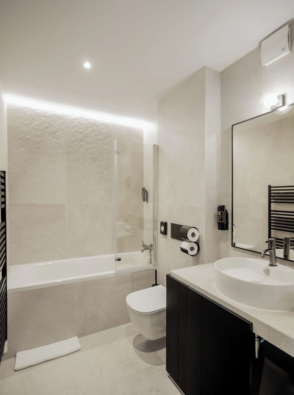Free toiletries, hair dryer, heated floors, towels
