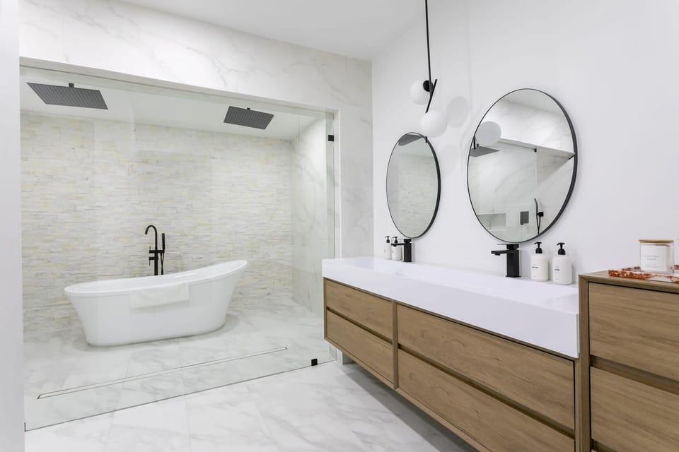 Refresh and recharge in our spa-inspired bathroom, boasting luxe finishes and all the pampering essentials you crave. - Primary Bathroom - The Solano - Scottsdale, AZ