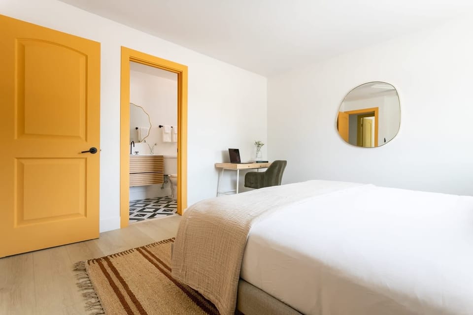 Space to spread out: a king bed, private desk, and an en-suite bath just steps away. - King Bedroom 2 - The Solano - Scottsdale, AZ