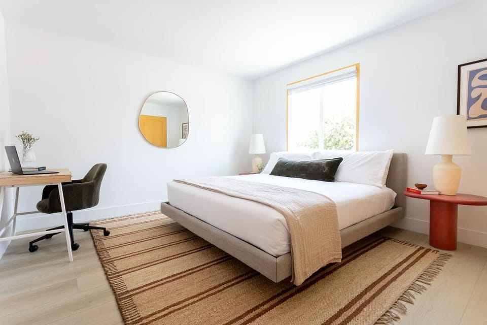 Charming and comfy, our second bedroom offers a serene retreat—ideal for catching those precious Z's - The Solano - Scottsdale, AZ