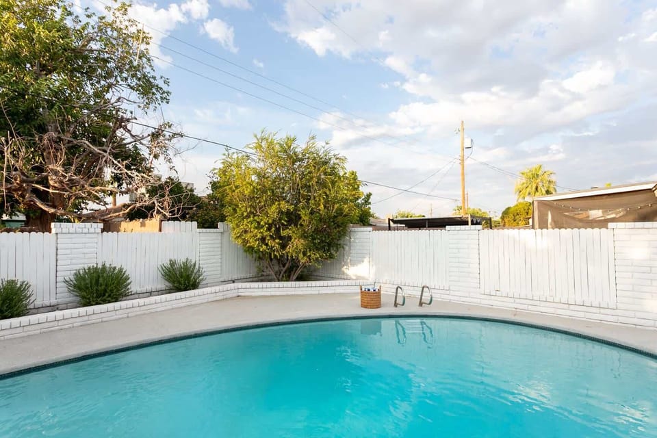 Take the plunge in your private, fenced-in pool--full sun, total privacy, and a shaded backyard just steps from the patio. - Pool - The Solano - Scottsdale, AZ