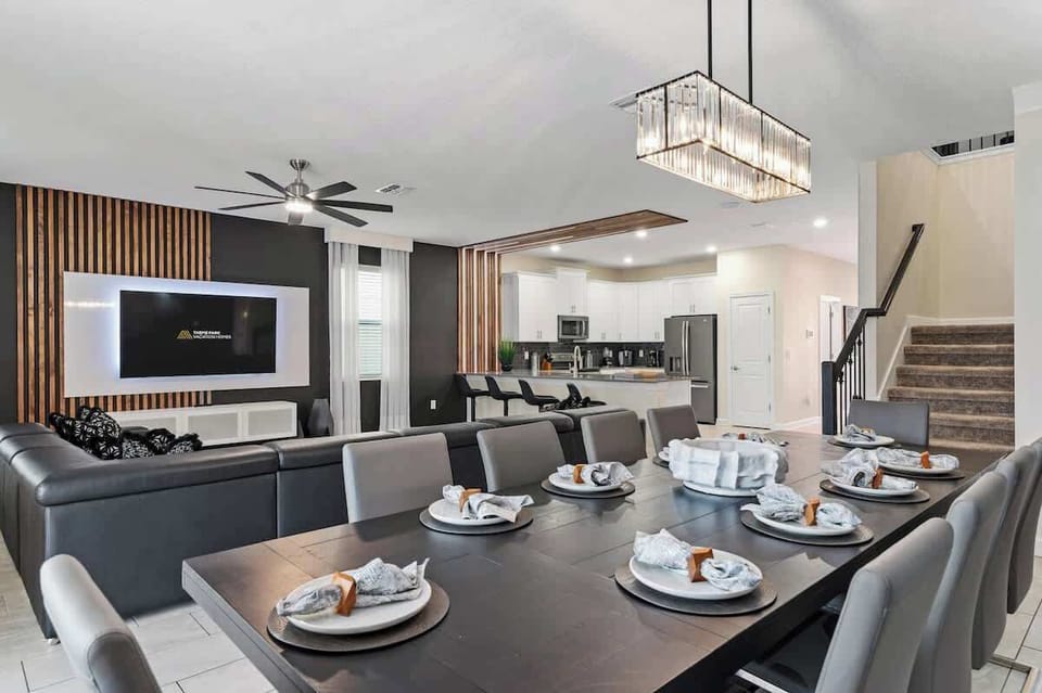 Large dining table for 10. Paired with barstools at the counter and an 8 top outdoor dining table, there is plenty of room for your large group to gather and dine