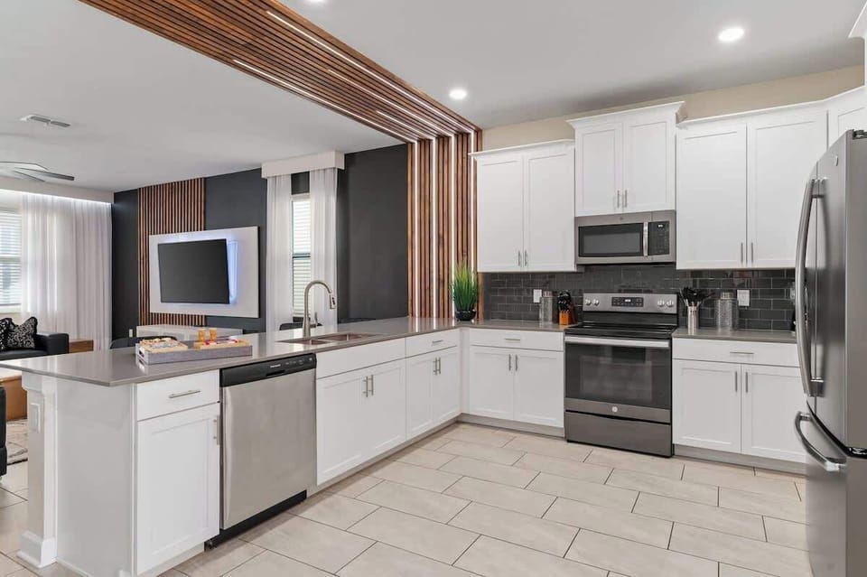 Large kitchen with all major appliances and fully stocked with dining and cook ware. Plus Keurig, drip coffee maker, blender and toaster. 