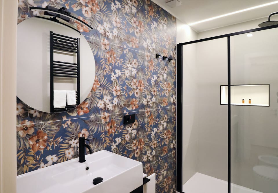 Shower, free toiletries, hair dryer, slippers