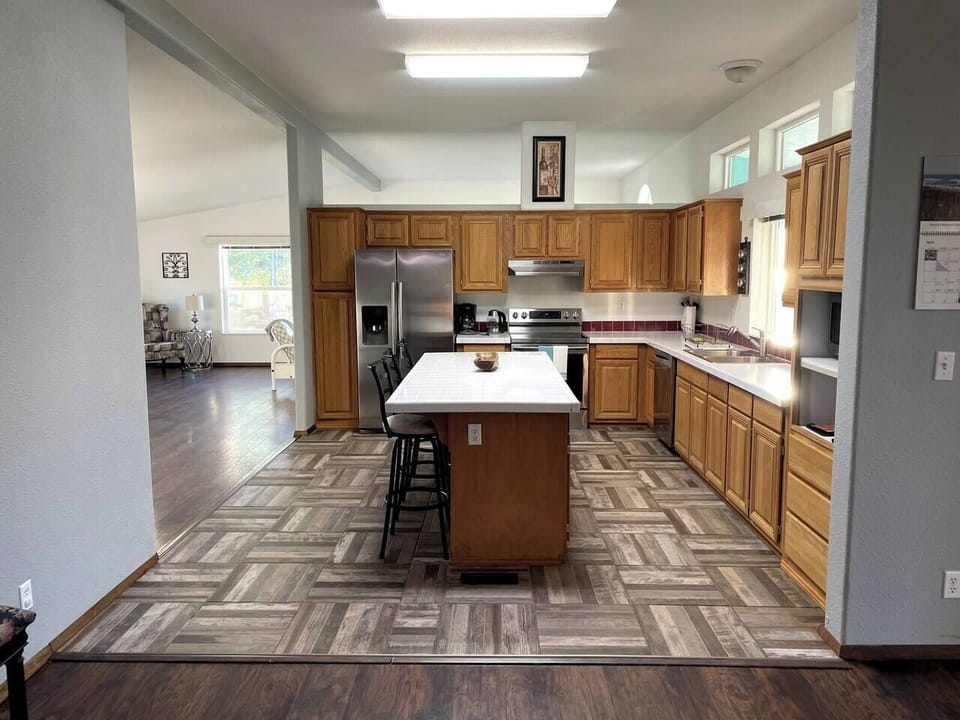 The expansive kitchen is fully equipped.