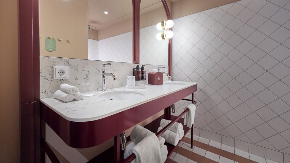 Premium Deluxe Room 5-person (with unlimited theme park admission) | Bathroom | Hair dryer, slippers, towels