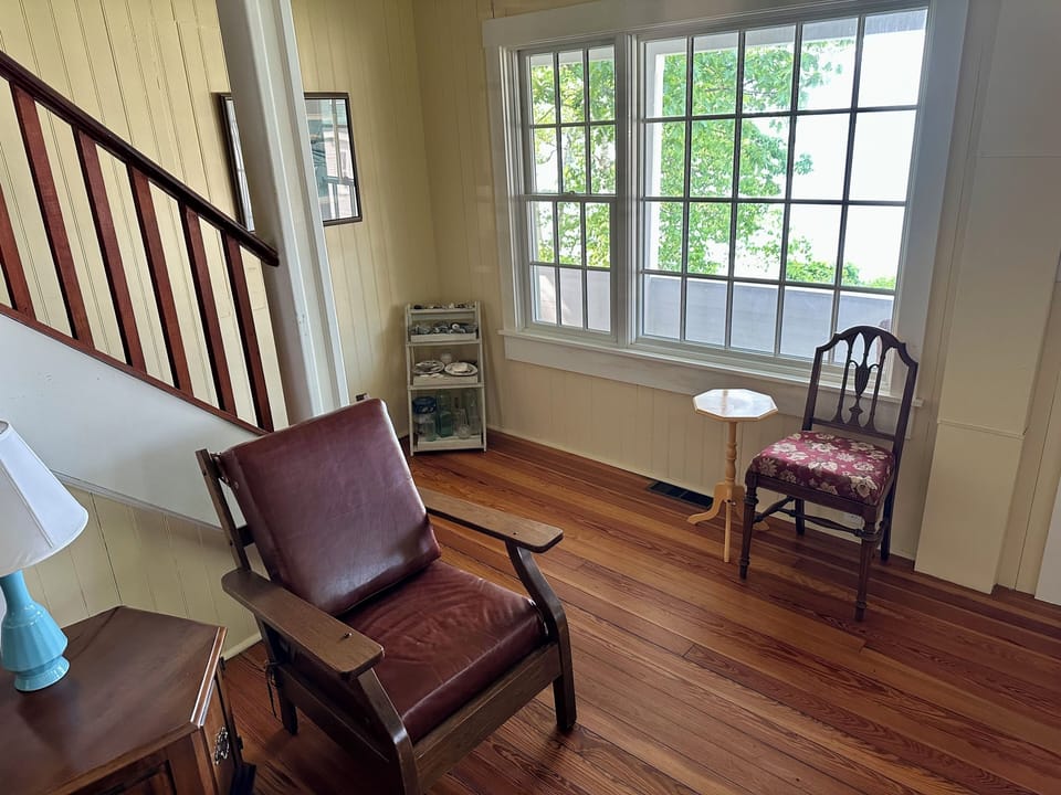 Staircase leading from living room to second floor