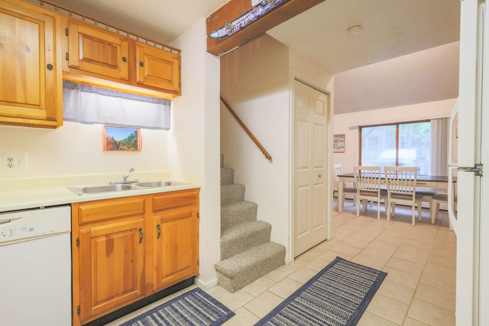 Stairs to sleeping loft from the kitchen