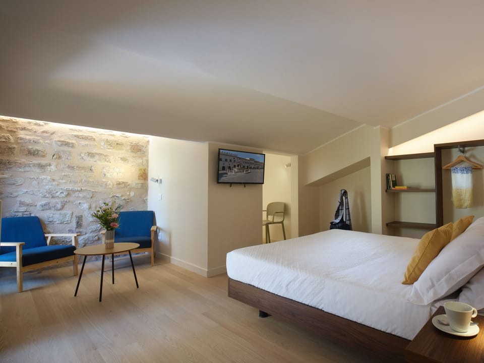 Junior Suite with Balcony | Premium bedding, individually furnished, laptop workspace