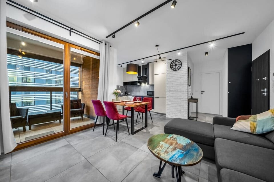 Comfortable Living Room with Sofa Bed and Smart TV | Book Now with RENTUJEMY