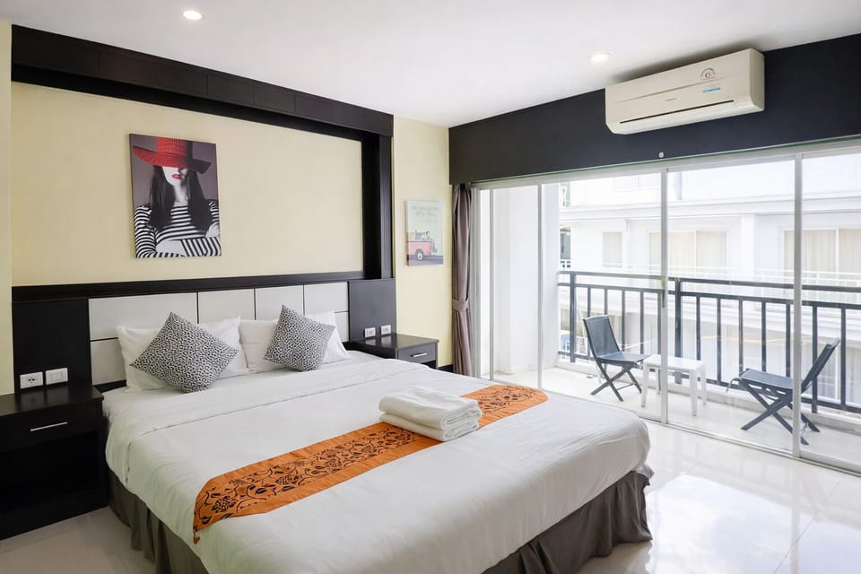 Deluxe Double Room, Balcony, City View | In-room safe, desk, soundproofing, free WiFi
