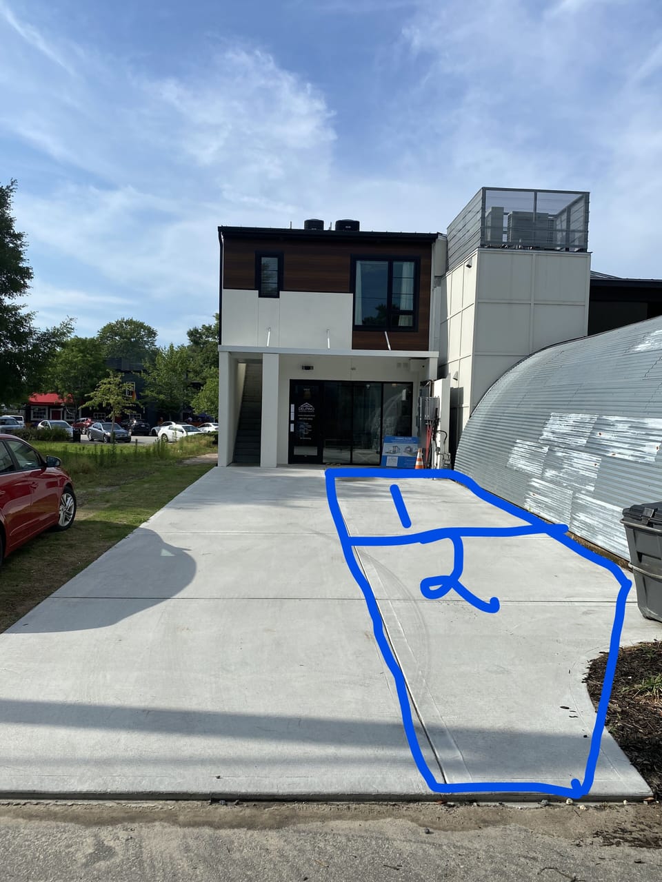 2 parking spaces on right side of the driveway