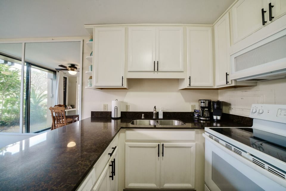 Clean, airy kitchen ready for easy meals & coffee moments