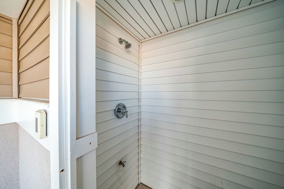 Enclosed outdoor shower
