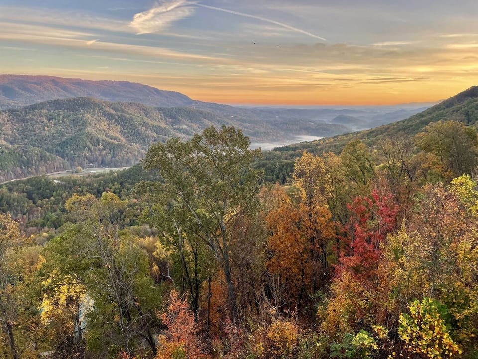 Views can be found from every room at Serenity. This is looking from the 3rd balcony down Walden's Creek towards Pigeon Forge & Sevierville