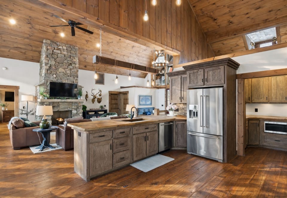 The open-concept layout flows seamlessly, connecting the kitchen, dining, and living areas for effortless gatherings.