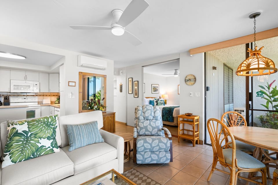 Open-concept living room, kitchen, and dining area designed for comfort and seamless flow