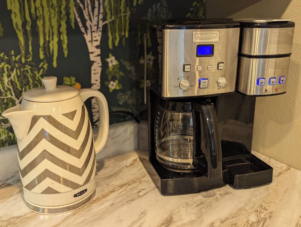 Coffee brewer (Keurig and drip) - pods and beans provided. 