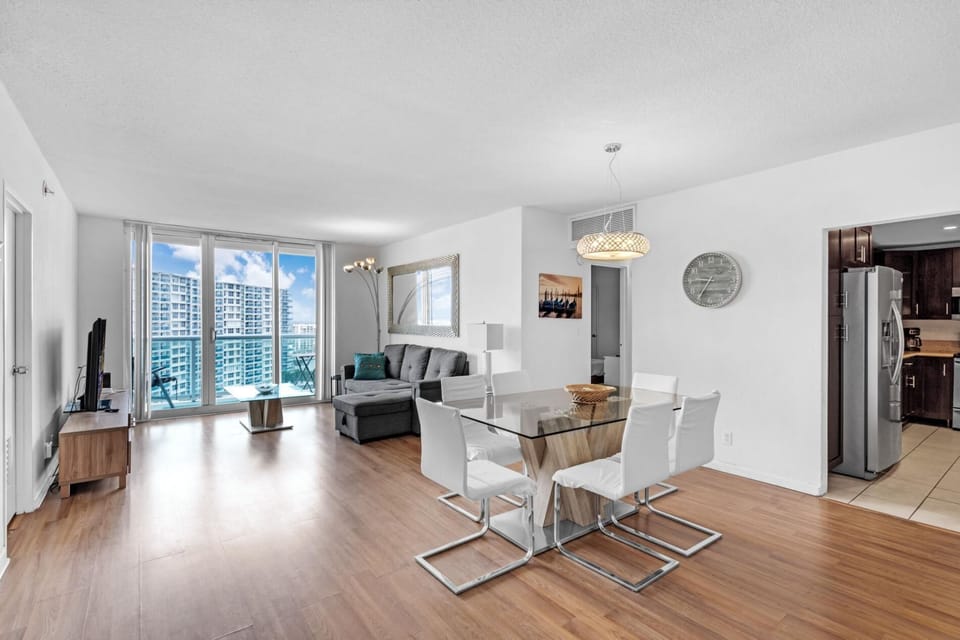 Beach Getaway: Modern 2BR Condo Pool & Gym Access (7603)