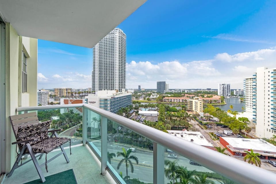 Beach Getaway: Modern 2BR Condo Pool & Gym Access (7621)