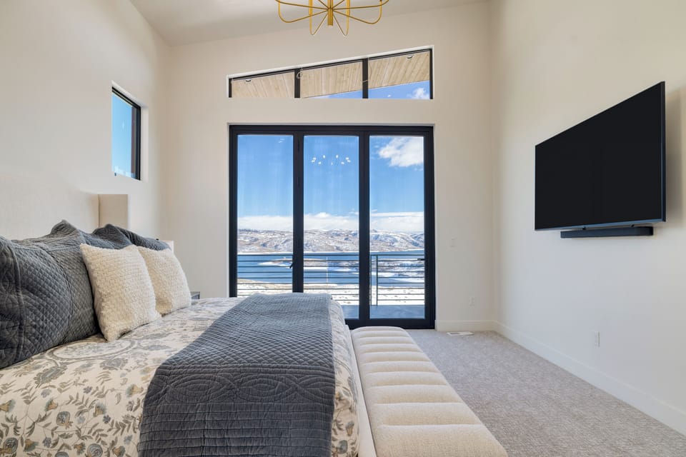 Primary bedroom features a king bed and ensuite bathroom.