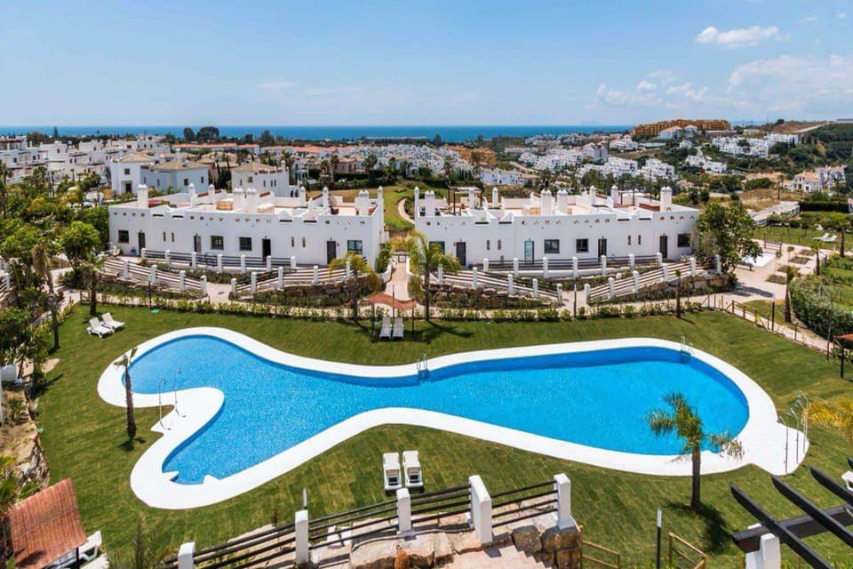 Family Townhome, Multiple Bedrooms, Mountainside (Luxe Golf & Family House Escape) | Pool | Seasonal outdoor pool