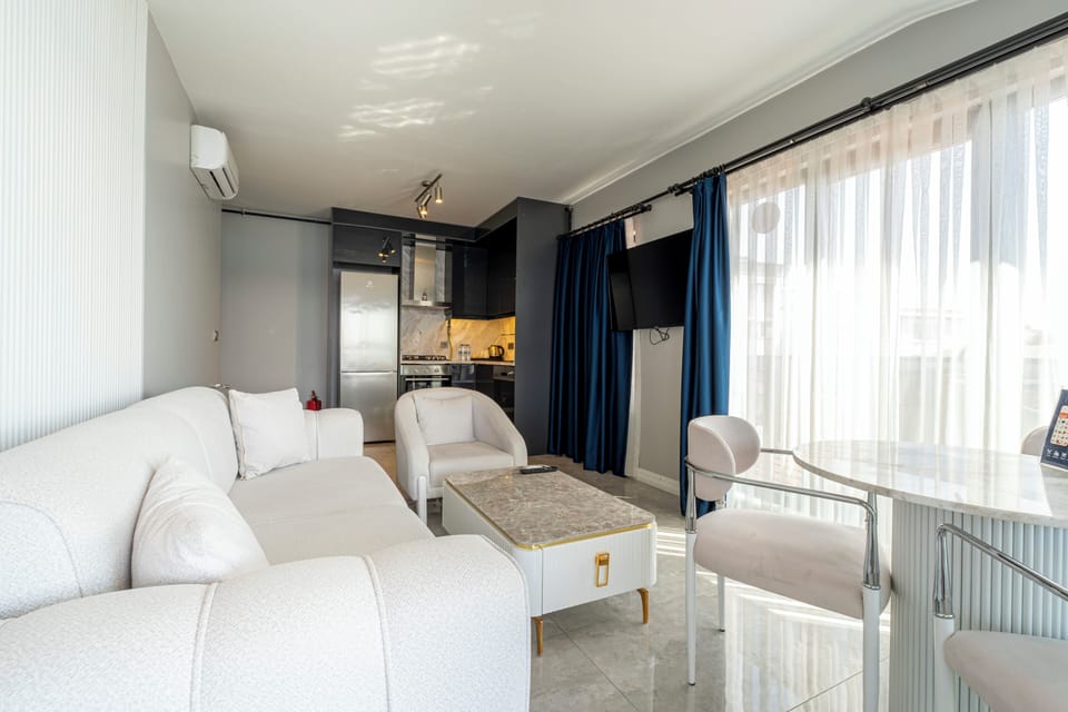 Presidential Suite, Sea View | Living area | 100-inch LCD TV with digital channels