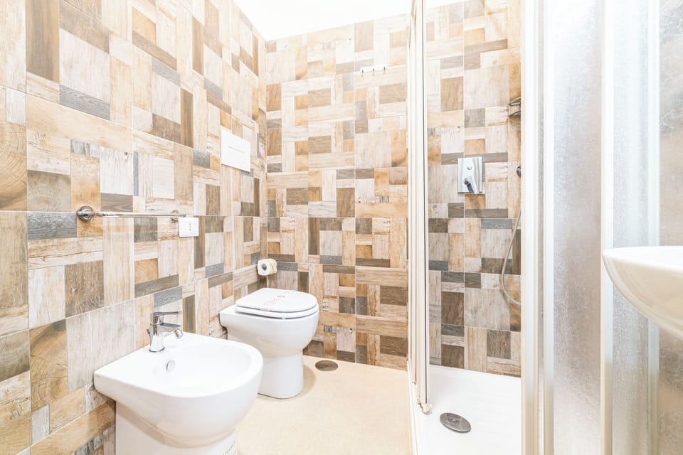 Comfort Room | Bathroom | Hair dryer, bidet, towels, soap