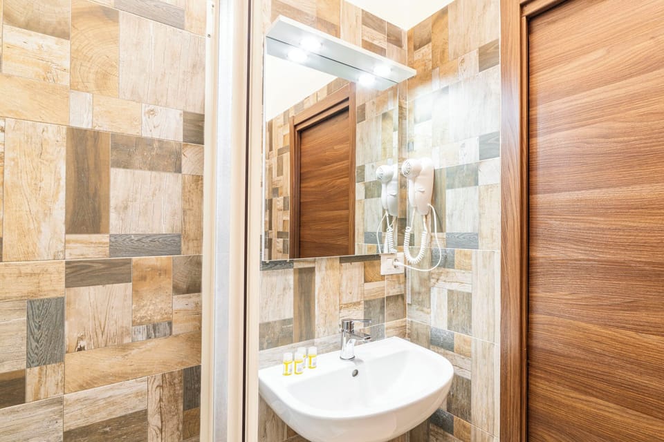 Comfort Room | Bathroom | Hair dryer, bidet, towels, soap