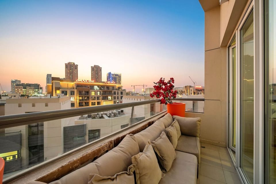 Balcony Retreat: Unwind with stunning sunset views and vibrant floral accents!