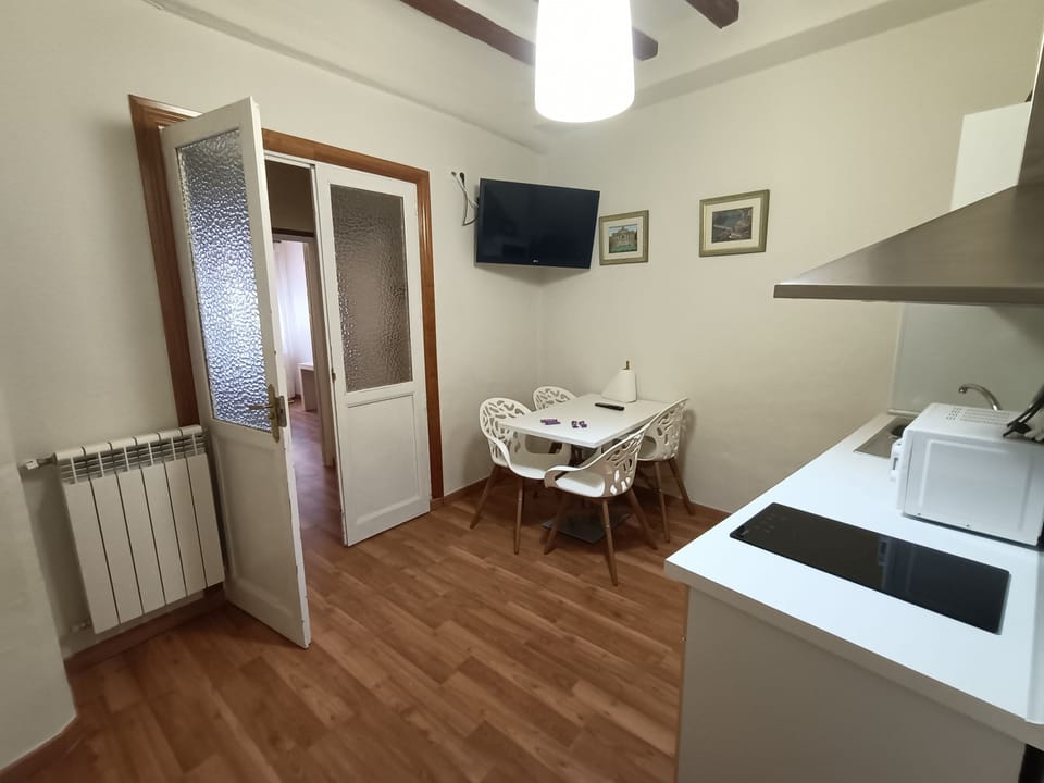 Basic Apartment, 2 Bedrooms | Living area | 40-inch flat-screen TV with cable channels