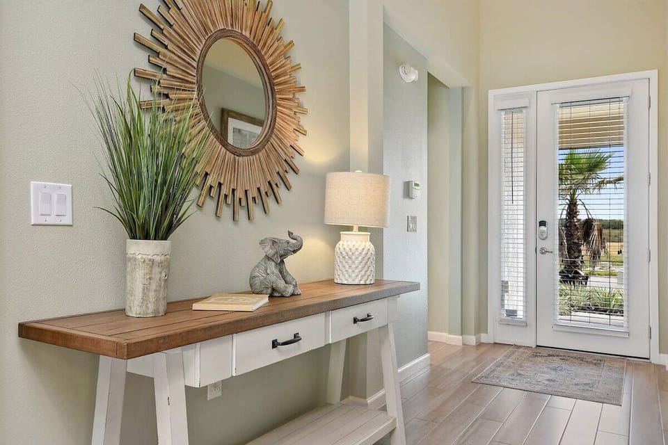 Step into the grand entrance of the most beautiful home, a space that sets the tone for the elegance, charm, and warmth awaiting within.