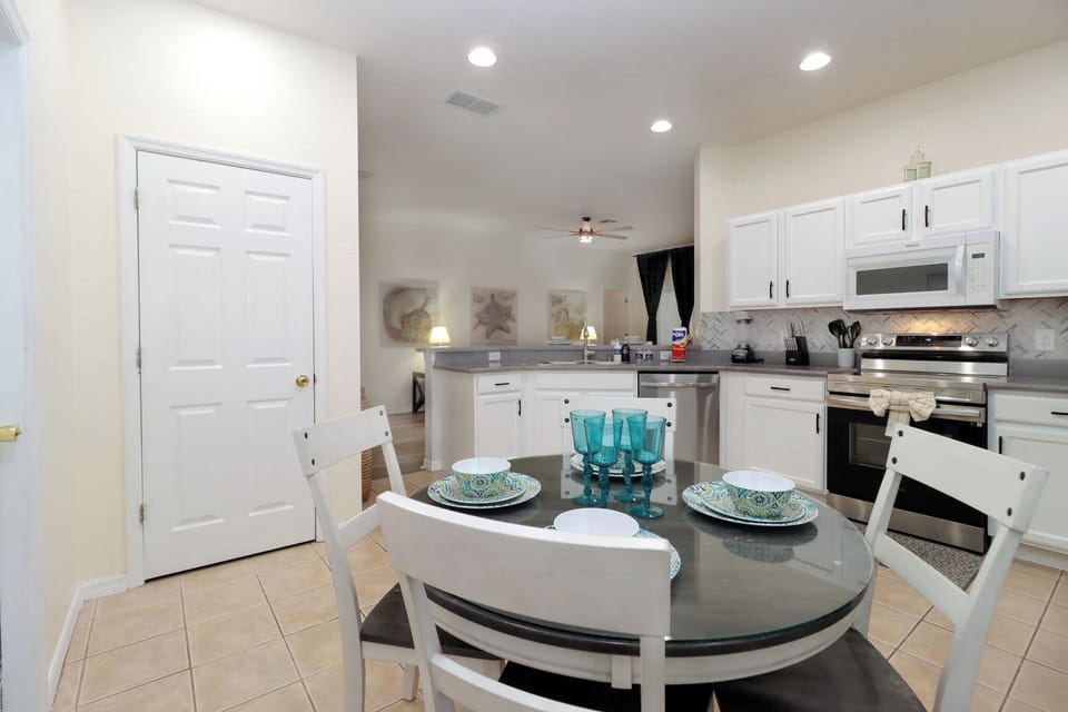 The spacious layout features modern appliances and ample counter space, making it ideal for preparing meals and entertaining guests.